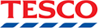 The Tesco logo, which is the brand name in red text over a dotted blue line.