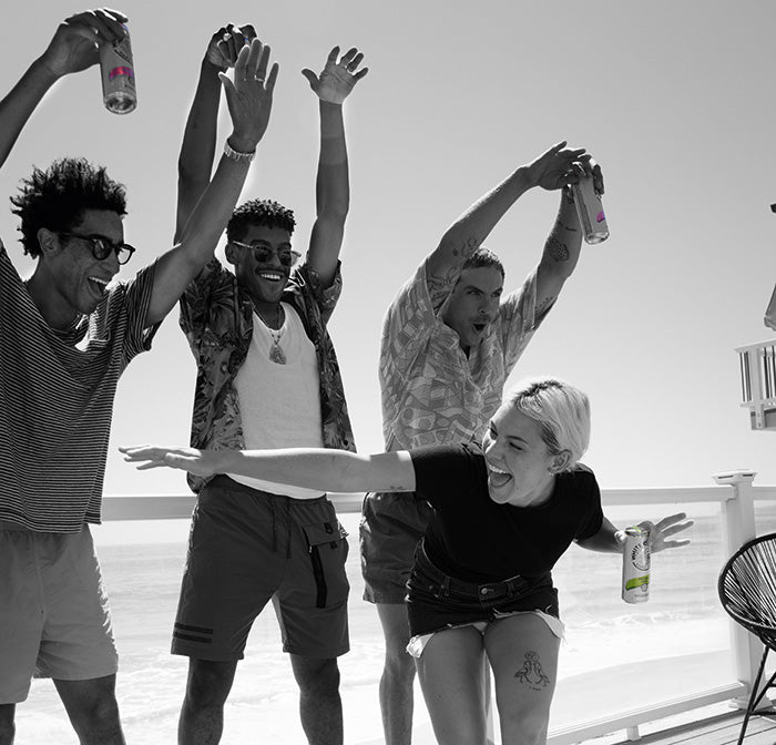 A group of friends enjoy some WHITE CLAW®